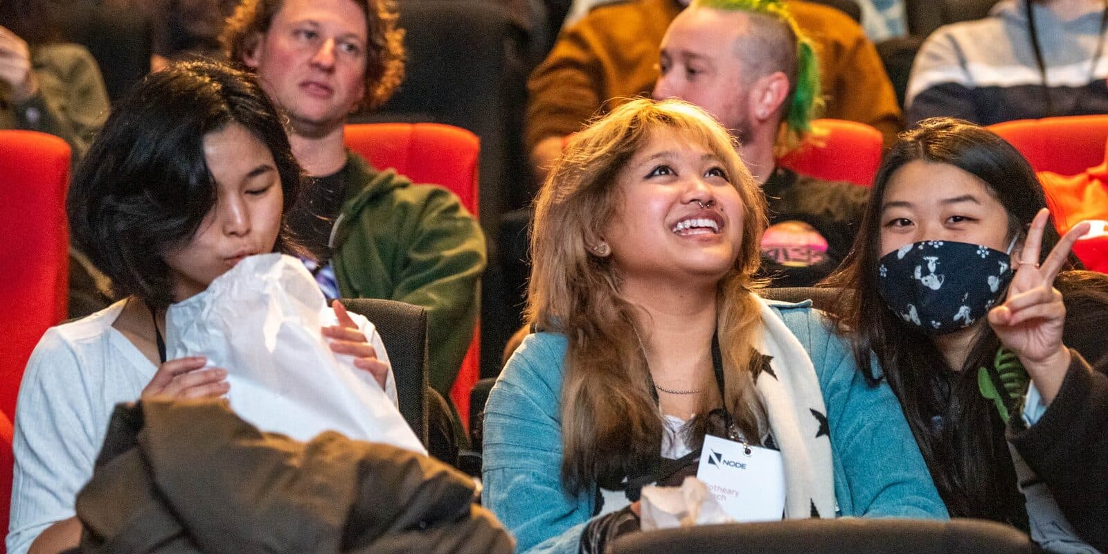 The Node Fest 2022 audience watching the showreel premiere