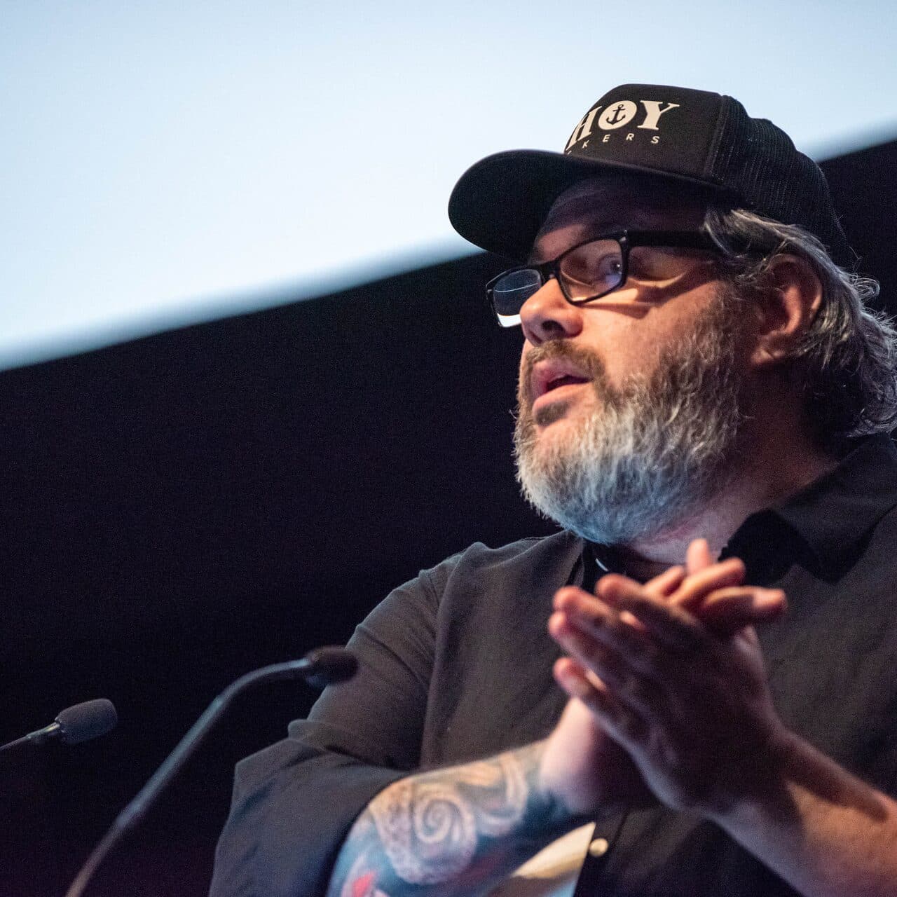 A speaker addressing the crowd from the stage at Node Fest 2022